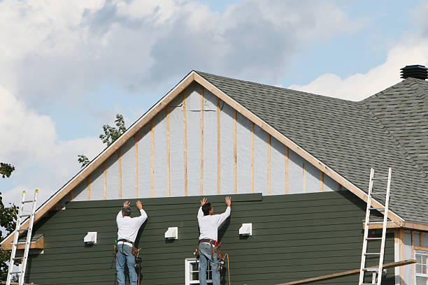 Professional Siding Installation technician working in Manchester, TN